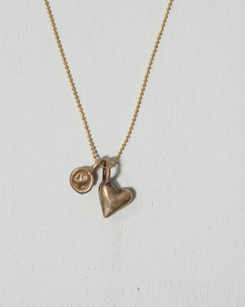 Pesci Che Volano Scorfano Fish and Red Heart Bronze Pendant (Copy)