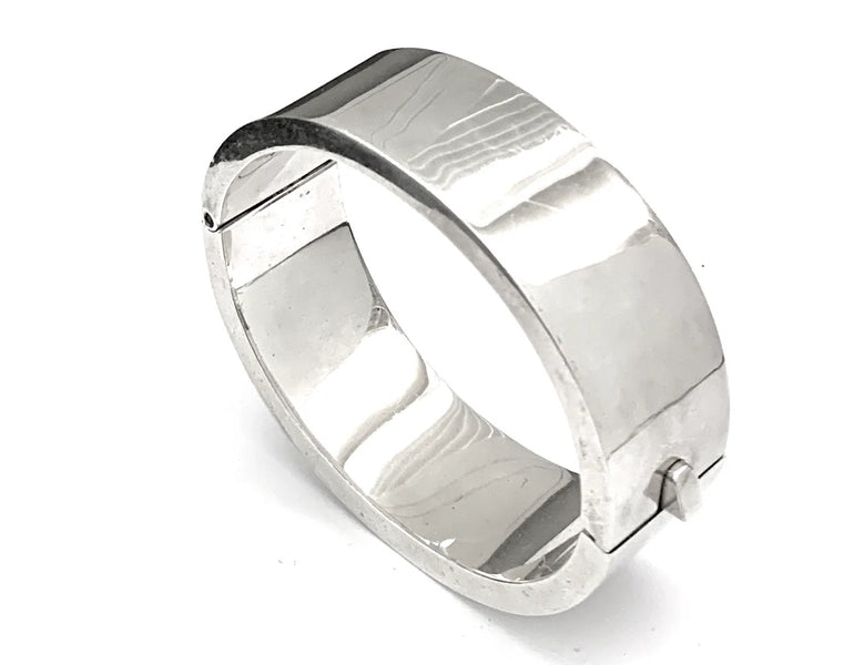Iron Clay Oval Sterling Silver Hinged Bangle